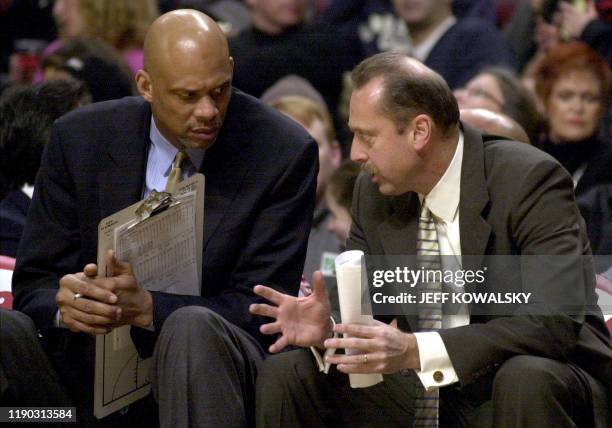 Los Angeles Clippers assistant coach Kareem Abdul-Jabbar talks with head coach Jim Todd during their game against the Chicago Bulls on 19 February,...