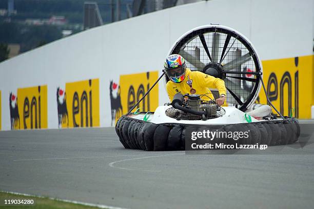 Alex De Angelis of Italy and JIR Moto2 drives the hovercraft on track during the pre-event "Riders from the 3 categories will drive hovercrafts"...