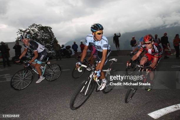 Alberto Contador of Spain and Saxo Bank Sungard shadowed closely by Cadel Evans of Australia and BMC Racing team and Andy Schleck of Luxemburg and...