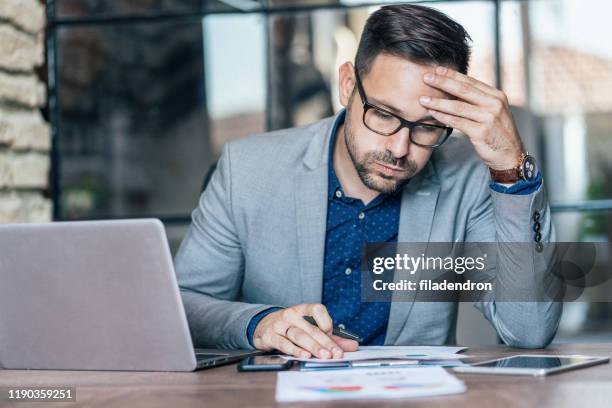 tired businessman - stressed businessman stock pictures, royalty-free photos & images