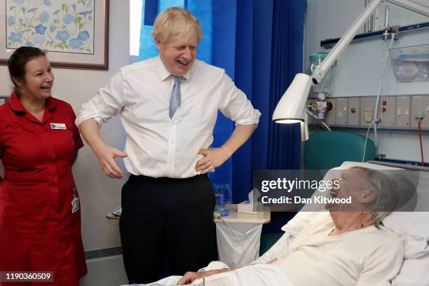 Prime Minister and Conservative Party leader, Boris Johnson speaks to patient Andrew Hall as he visits West Cornwall Community hospital on November...