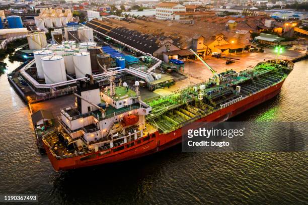 tanker ship loading - grease stock-fotos und bilder