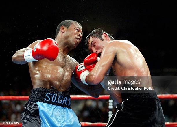 Shane Mosley, blue trunks, fights Oscar De La Hoya, black trunks, during a 12-round WBC/WBA Super Welterweight Championship bout held a the MGM Grand...