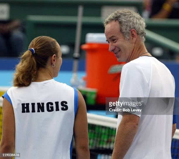 Martina Hingis and John McEnroes chat during player introductions. The New York Sportimes defeated the Houston Wranglers, 22-17, at Westside Tennis...