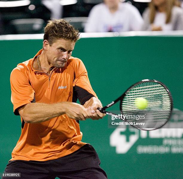 Jan-Michael Gambill hits a return against Juan Monaco during match action. Juan Monaco defeated Jan-Michael Gambill 7-5,6-4 in during first round...