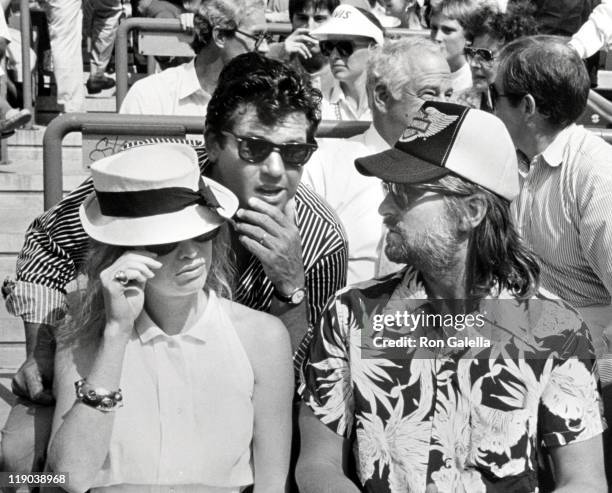 Michael Douglas, Diandra Douglas, and Jann Wenner during U.S. Tennis Open Championships- September 9, 1988 at Flushing Meadows in New York City, New...