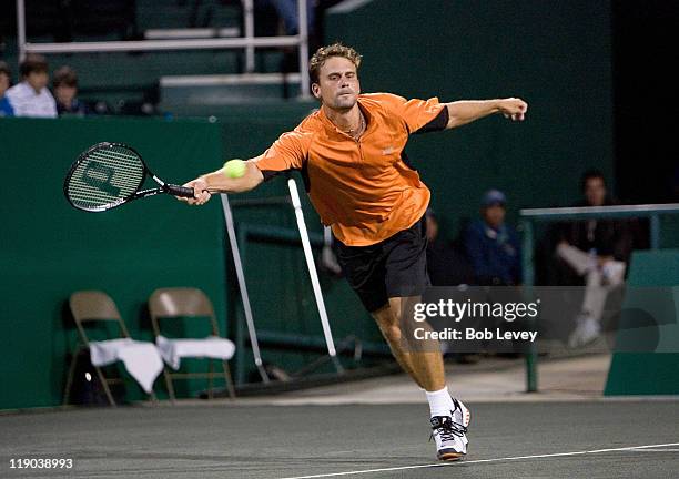 Jan-Michael Gambill hits a return against Juan Monaco during match action. Juan Monaco defeated Jan-Michael Gambill 7-5,6-4 in during first round...