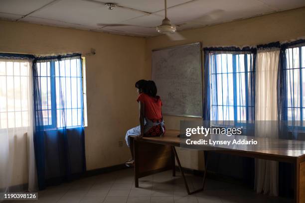 Year-old Nigerian woman in a shelter in Benin City, Nigeria. She went to Moscow in 2013 knowing she would be obliged to sell sex, but she was unaware...