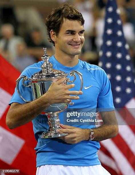 Roger Federer of Switzerland, captures the 2006 US Open title, defeating Andy Roddick of the USA, 6-2, 4-6, 7-7, 6-1 at The USTA Billie Jean King...