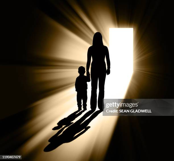 parenting silhouette - woman walking out door silhouette stock pictures, royalty-free photos & images
