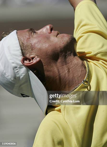 Lleyton Hewitt serving during his defeat of Dominik Hrbaty in their 4th round match at the 2005 US Open at the National Tennis Center in Flushing,...