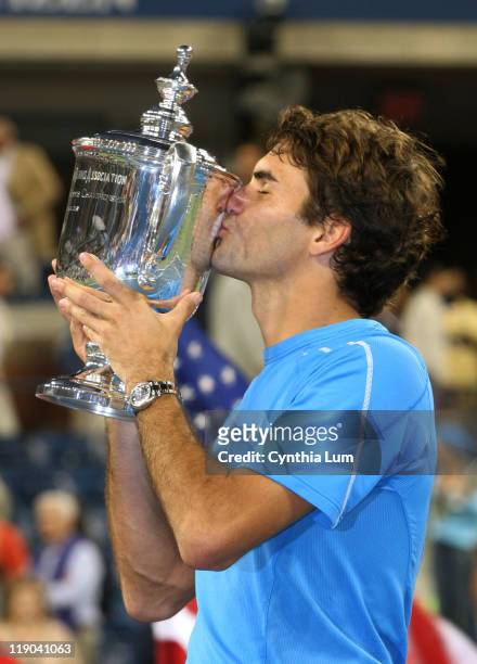 Roger Federer of Switzerland, captures the 2006 US Open title, defeating Andy Roddick of the USA, 6-2, 4-6, 7-7, 6-1 at The USTA Billie Jean King...