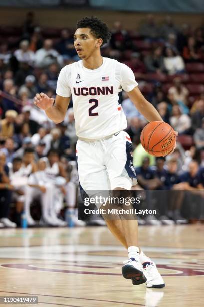 James Bouknight of the Connecticut Huskies dribbles the ball during a second round Charleston Classic basketball game against the Xavier Musketeers...