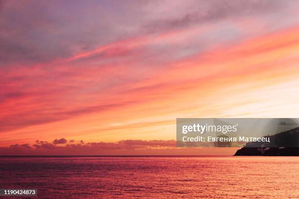 gorgeous wallpaper sundown background at amalfy coast, italy with magnificent luminous colors - rosenfarben stock-fotos und bilder