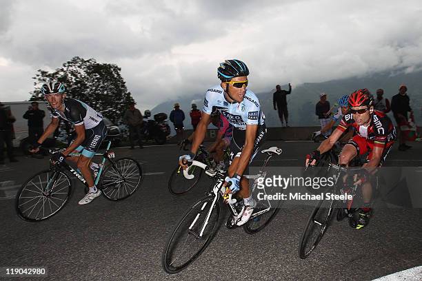 Alberto Contador of Spain and Saxo Bank Sungard shadowed closely by Cadel Evans of Australia and BMC Racing team and Andy Schleck of Luxemburg and...