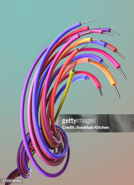 multi coloured twisted cabled - computer cable stock pictures, royalty-free photos & images