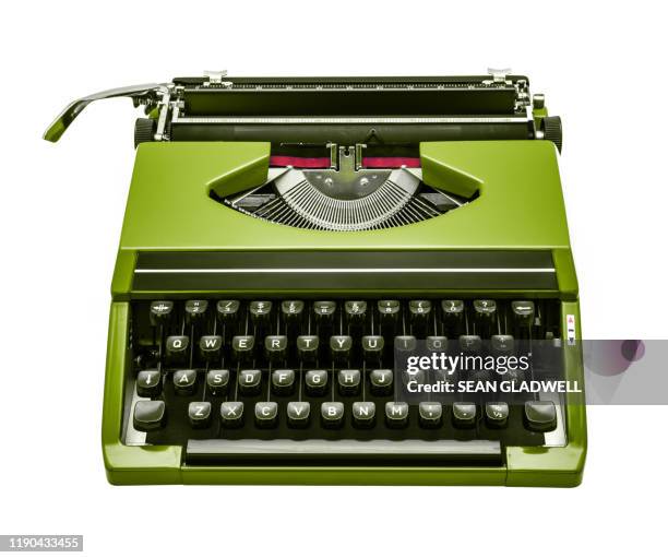 isolated green typewriter - typewriter stockfoto's en -beelden