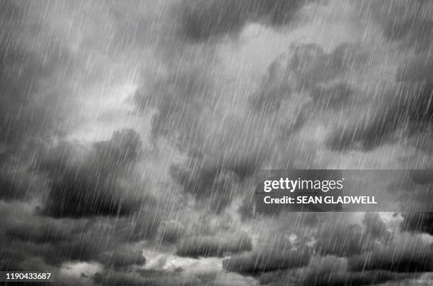 heavy rain - rainy day stockfoto's en -beelden