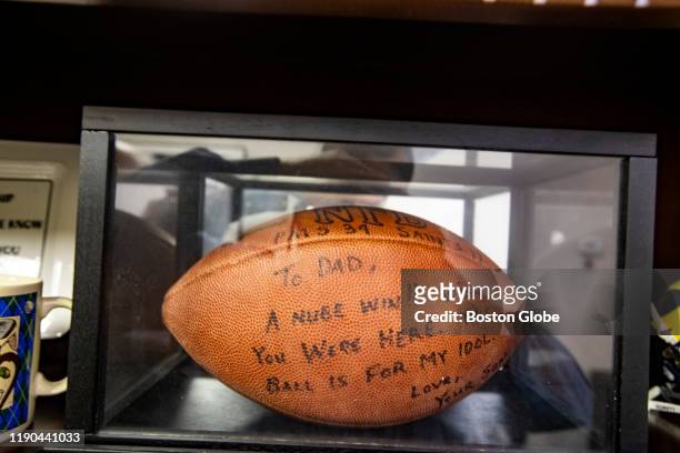 Football signed by Tom Brady to his father from the November 2001 Patriots game where Brady was started instead of a newly-healthy Drew Bledsoe and...