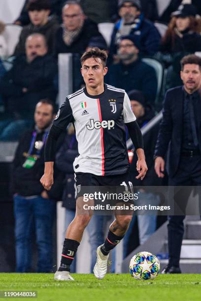 Paulo Dybala of Juventus in action during the UEFA Champions League group D match between Juventus and Atletico Madrid at Juventus Arena on November...