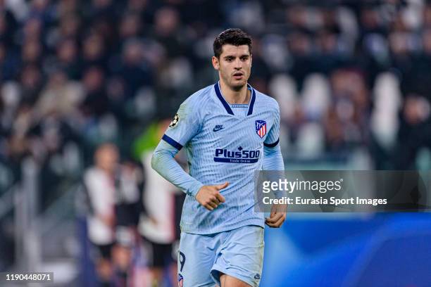 Alvaro Morata of Atletico de Madrid runs in the field during the UEFA Champions League group D match between Juventus and Atletico Madrid at Juventus...