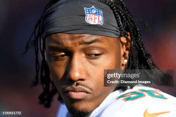 Defensive end Taco Charlton of the Miami Dolphins on the sideline in the third quarter of a game against the Cleveland Browns on November 24, 2019 at...