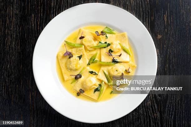 fresh italian ravioli with sage and ricotta cheese - tortellini bildbanksfoton och bilder