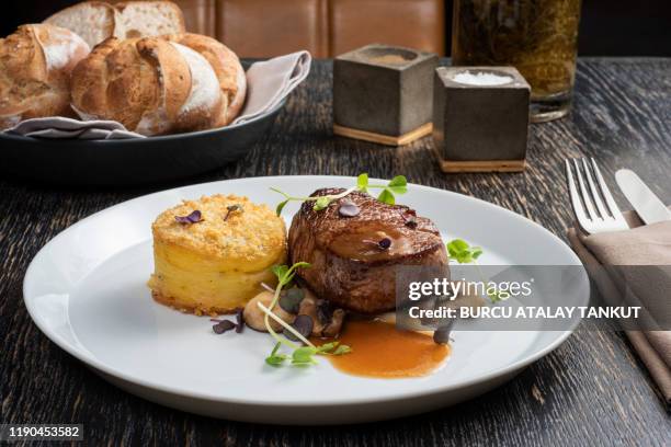 filet mignon with bordelaise sauce and prepared potato - gourmet steak stock pictures, royalty-free photos & images