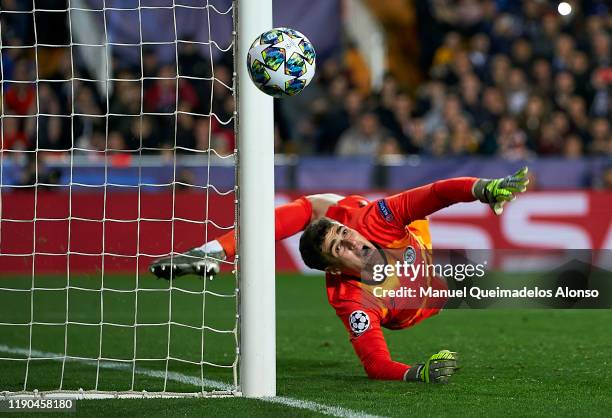 Kepa Arrizabalaga of Chelsea stops a penalty during the UEFA Champions League group H match between Valencia CF and Chelsea FC at Estadio Mestalla on...