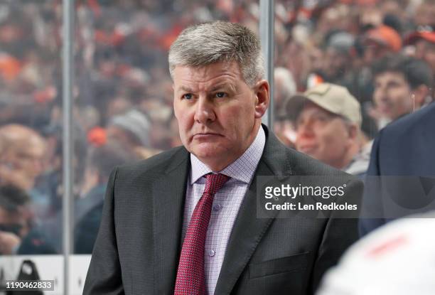 Head Coach of the Calgary Flames Bill Peters looks on during his team's game against the Philadelphia Flyers on November 23, 2019 at the Wells Fargo...