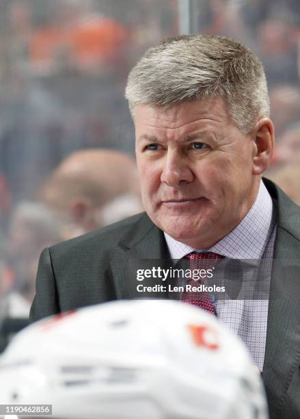 Head Coach of the Calgary Flames Bill Peters looks on during his team's game against the Philadelphia Flyers on November 23, 2019 at the Wells Fargo...