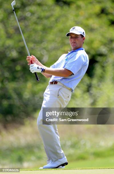 Hunter Haas reacts to a shot on the 16th hole during the first round of the Viking Classic at Annandale Golf Club on July 14, 2011 in Madison,...