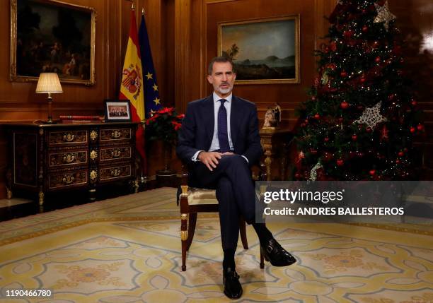 Spanish King Felipe VI delivers his Christmas Eve message at the Zarzuela Palace in Madrid on December 24, 2019.