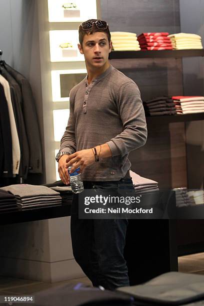 David Henrie from Disney's 'Wizards of Waverly Place' shopping at DKNY in Westfield shopping centre at Westfield on July 14, 2011 in London, England.