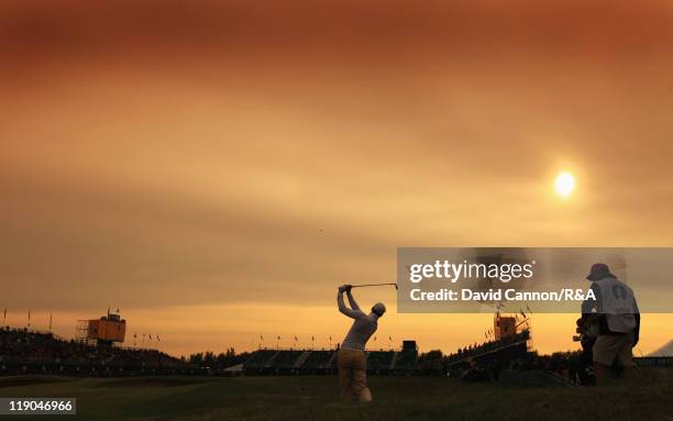 Martin Kaymer of Germany plays into the 18th green during the first round of The 140th Open Championship at Royal St George's on July 14, 2011 in...