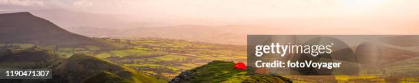 summer sunset tents camping on mountain above idyllic valley panorama - camping selvagem imagens e fotografias de stock