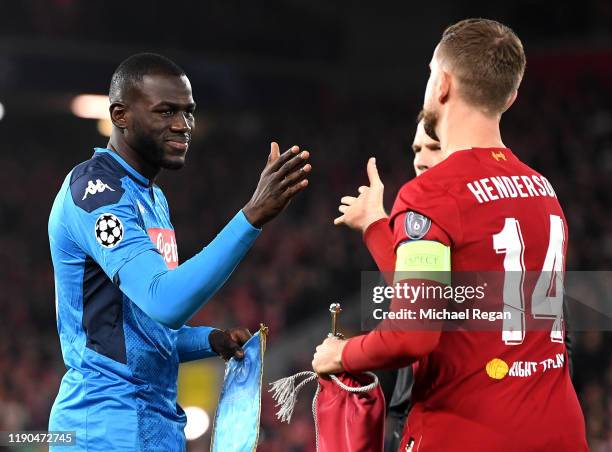 Kalidou Koulibaly of Napoli shakes hands with Jordan Henderson of Liverpool prior to the UEFA Champions League group E match between Liverpool FC and...