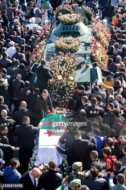 This picture taken on December 25, 2019 shows a view of the funeral of Algeria's late military chief Lieutenant general Ahmed Gaid Salah in the...