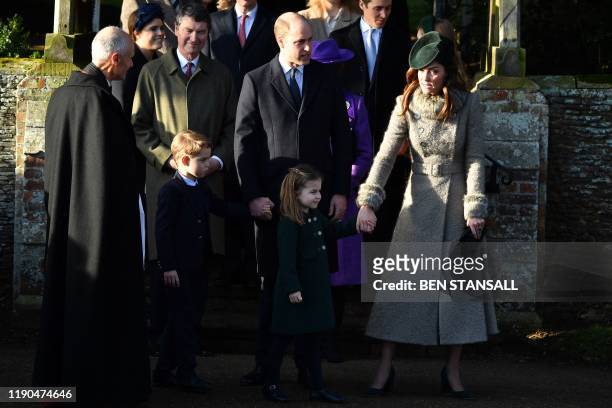 Britain's Prince George of Cambridge, Britain's Prince William, Duke of Cambridge, Britain's Princess Charlotte of Cambridge, and Britain's...