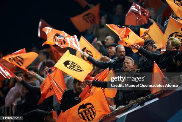 Valencia fans show their support prior to the UEFA Champions League group H match between Valencia CF and Chelsea FC at Estadio Mestalla on November...