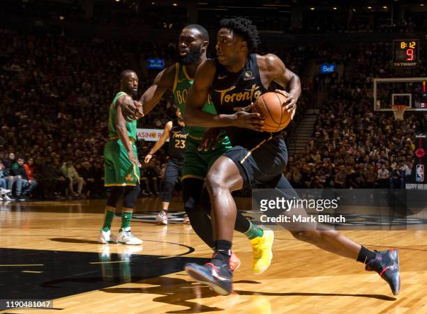 Anunoby of the Toronto Raptors handles the ball against the Boston Celtics on December 25, 2019 at the Scotiabank Arena in Toronto, Ontario, Canada....
