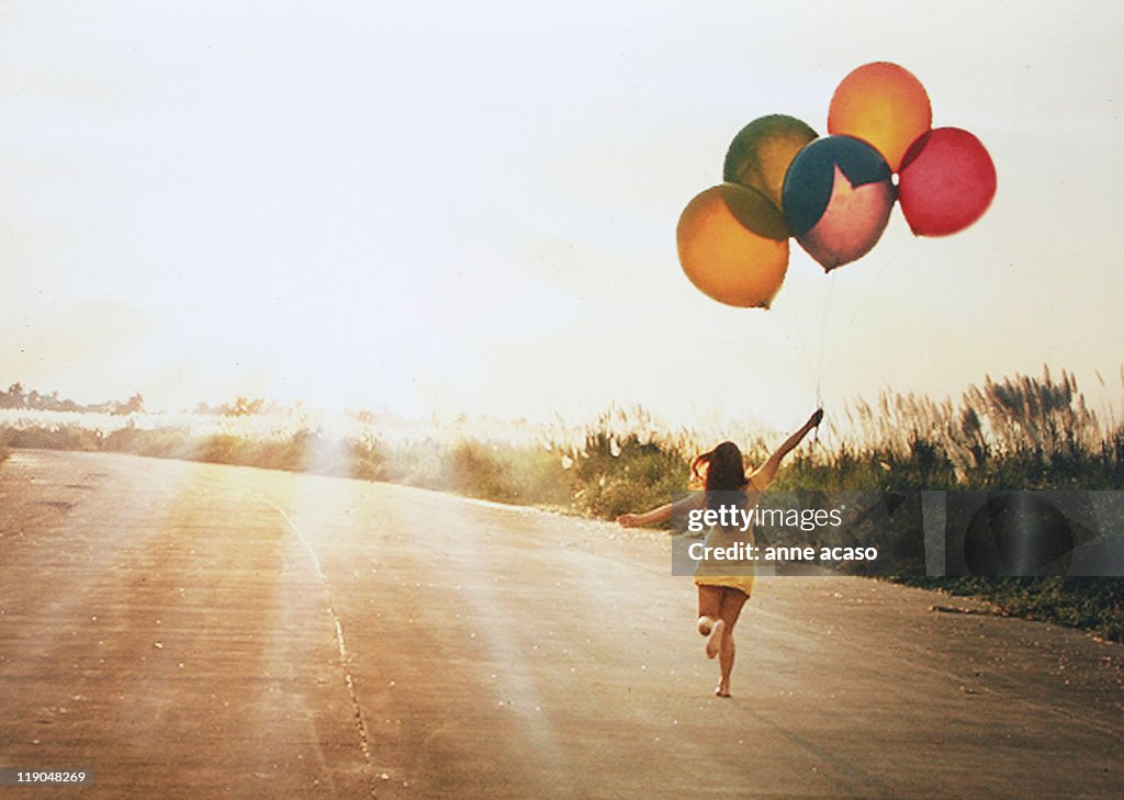 Girl with balloons