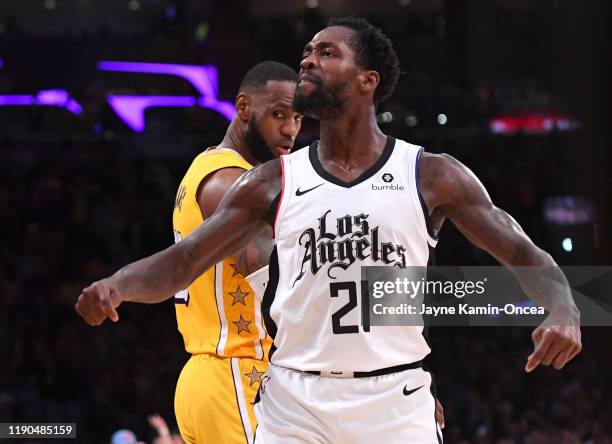 Patrick Beverley of the Los Angeles Clippers looks at the crowd after he blocked a shot by LeBron James of the Los Angeles Lakers in the second half...