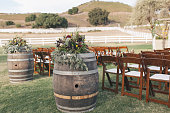 Wine barrels wedding ceremony decor