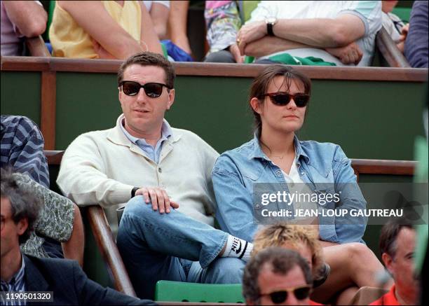 L'homme d'affaires lyonnais Pierre Botton et son épouse, la fille du député-maire de Lyon Michel Noir, assistent sur le court central, le 28 mai 1995...