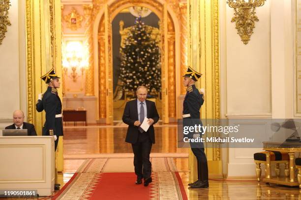 Russian President Vladimir Putin enters the hall during the State Council's meeting at Grand Kremlin Palace in Moscow, Russia, December 2019.Putin...