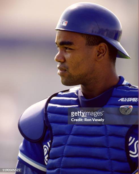 Carlos Delgado of the Toronto Blue Jays looks on during a major league baseball spring training game in Dunedin, Florida prior to the 1994 season.