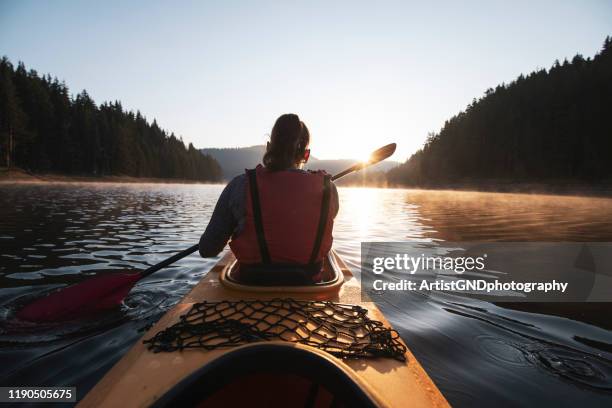 kayaking in nature. - life jacket stock pictures, royalty-free photos & images