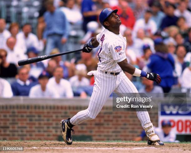 Sammy Sosa of the Chicago Cubs bats during an MLB game at Wrigley Field in Chicago, Illinois during the 1997 season.