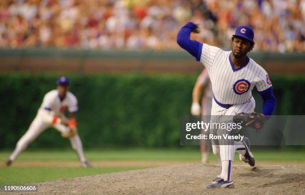 Lee Smith of the Chicago Cubs pitches during an MLB game at Wrigley Field in Chicago, Illinois during the 1986 season.